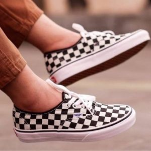 Classic Vans checkerboard canvas sneaker. Men’s size 6.5, women’s size 8.